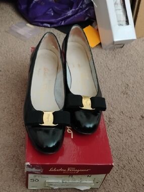 Salvatore Ferragamo Black Patent Vara Bow Flats with Gold Plaque